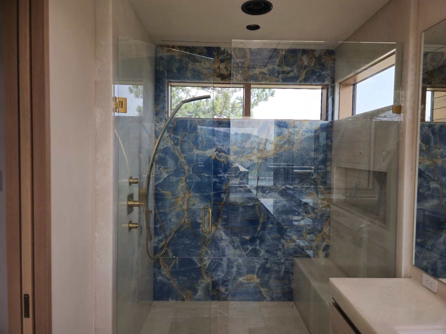 Frameless shower door installation in a Fort Collins